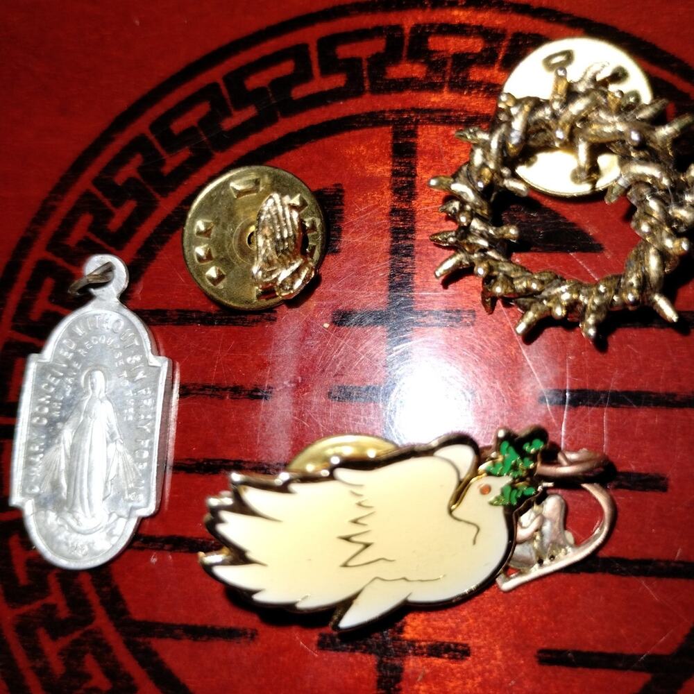 Vintage lot of religious pinbacks and one pendant